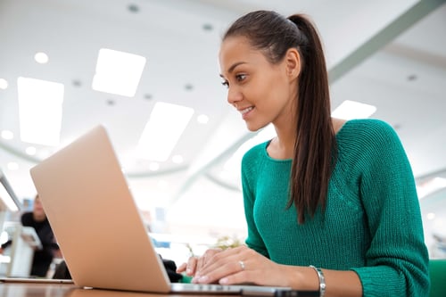 Girl taking class on computer