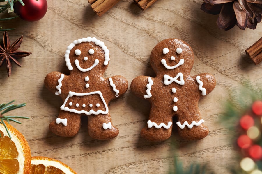 Homemade gingerbread Christmas cookies decorated with white icing
