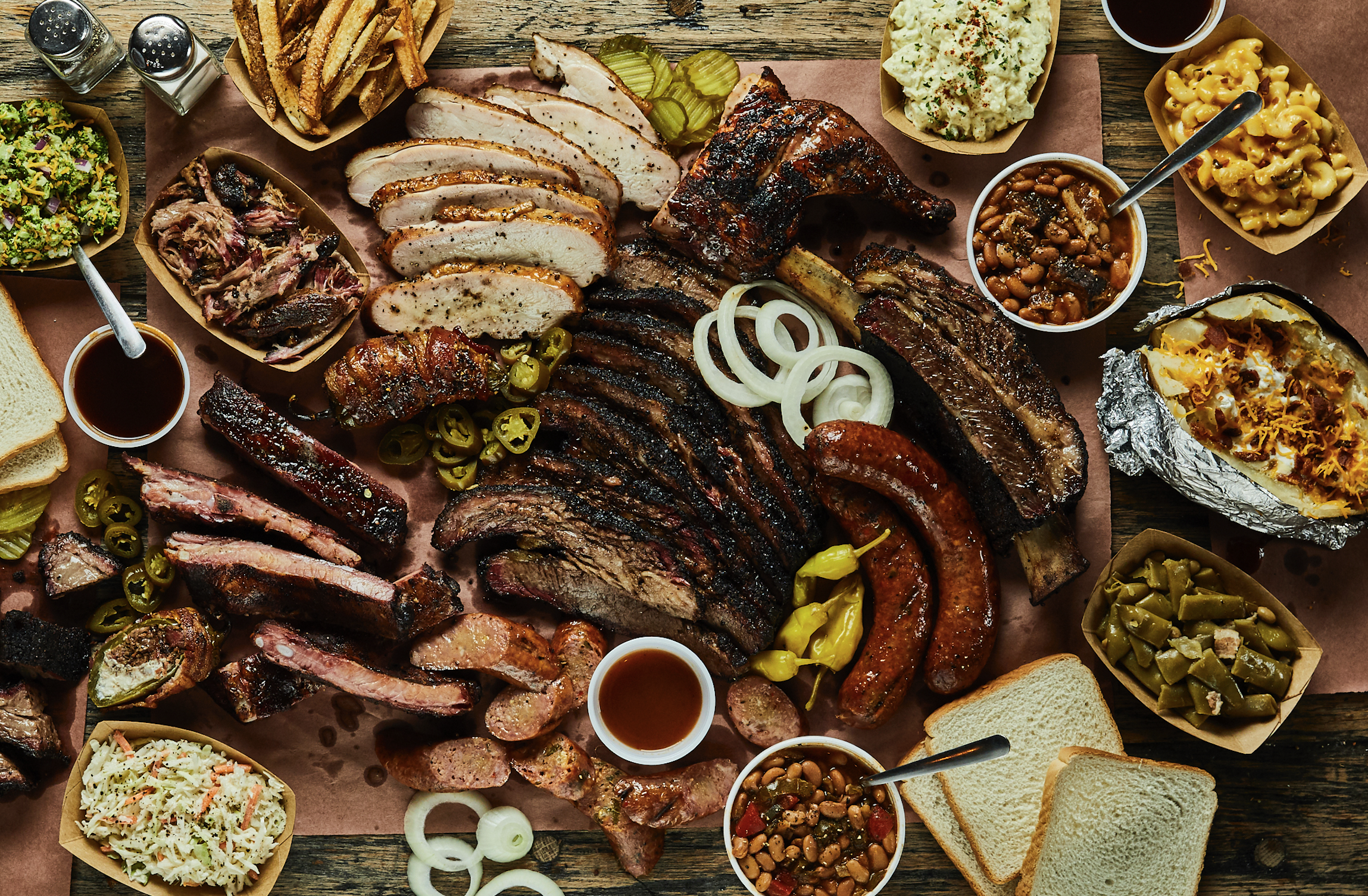 Texas BBQ platter across table